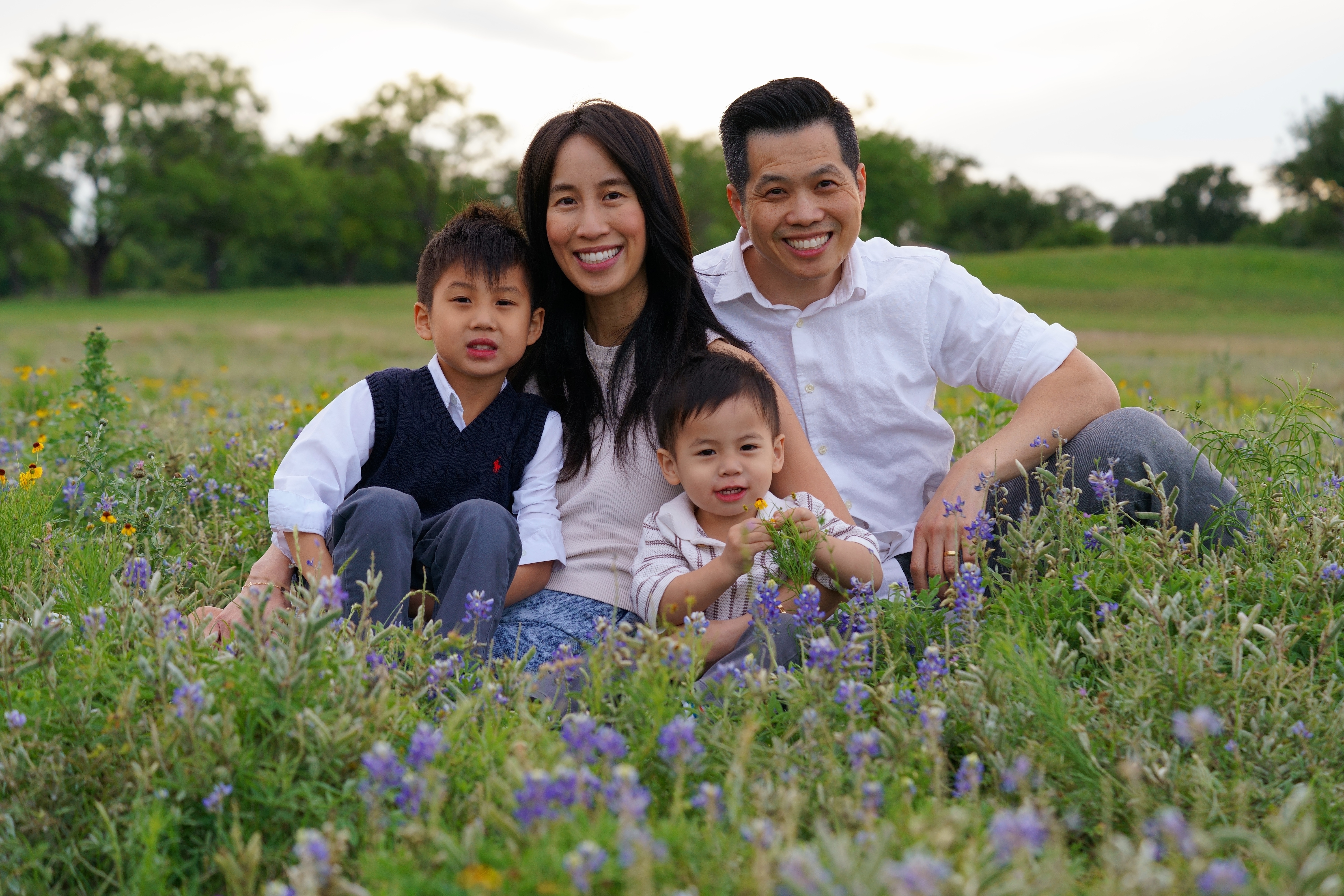 Dr. Thu Trinh and Dr. Robert Banh with their family, co-founders of Rise Dental